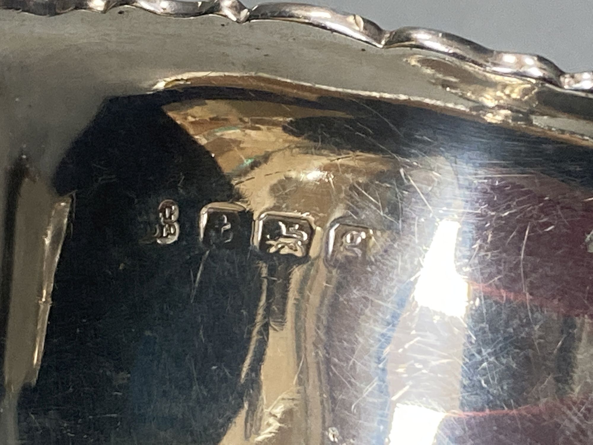 A pair of Edwardian silver sauceboats, Birmingham, 1906, height 8.9cm, 8.5oz.
